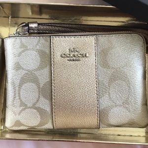 Coach wristlet gold